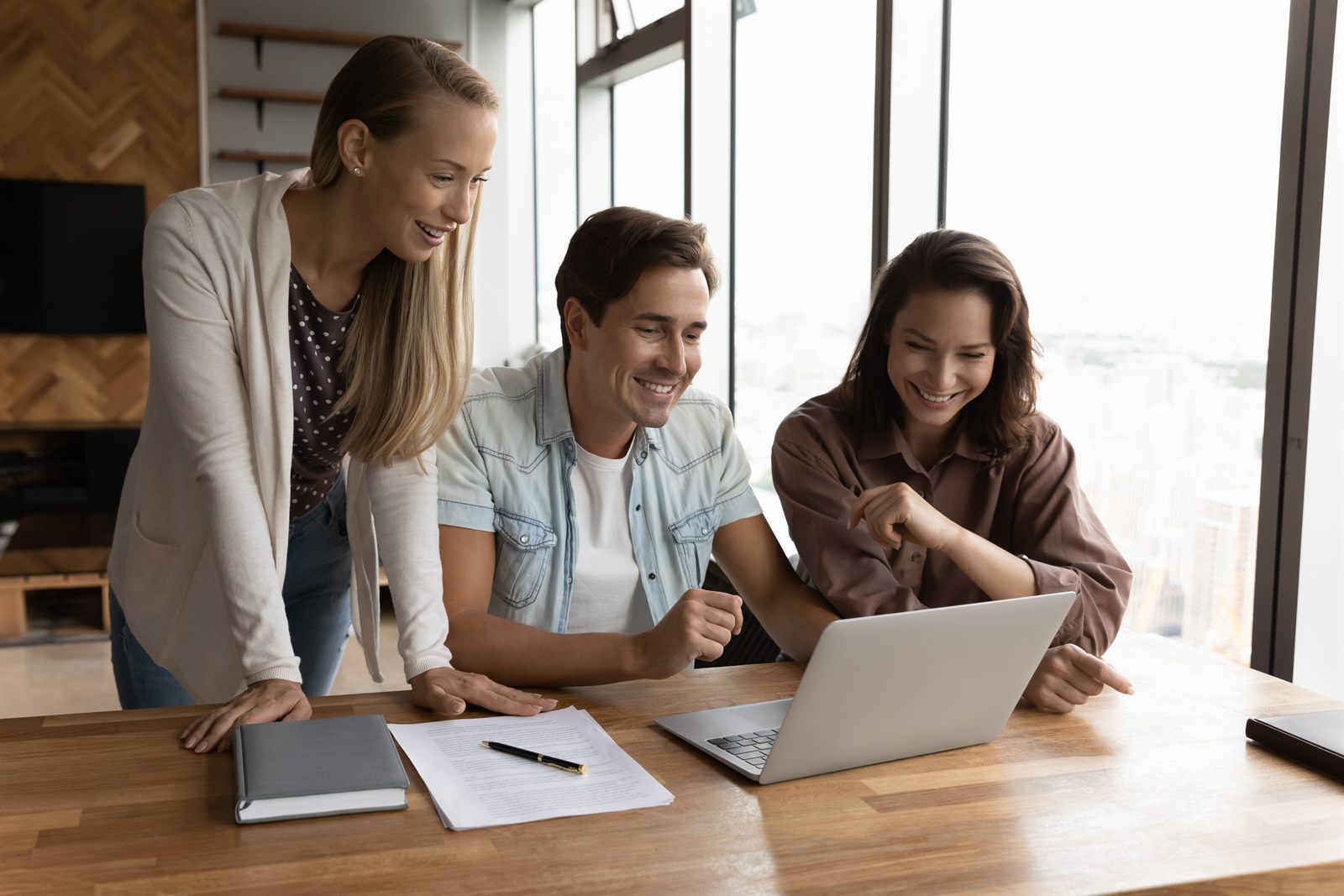 Business owners reviewing their finances together with their accountant