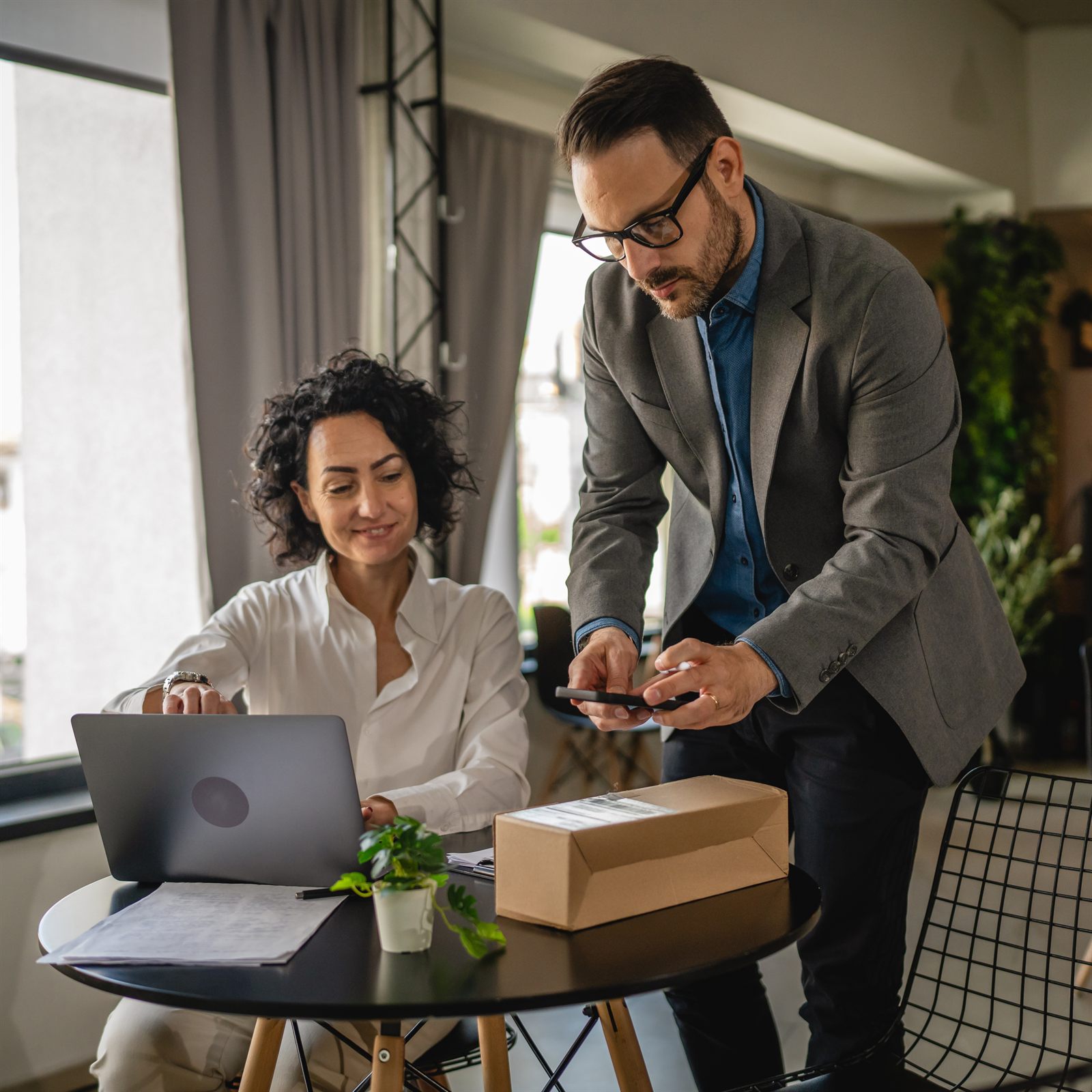 A business owner reviewing deductions with a CPA on a video call